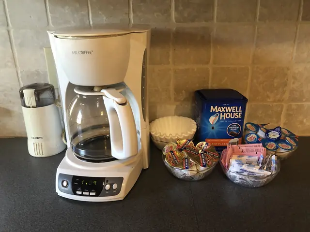 Coffee maker, grinder and supplied coffee