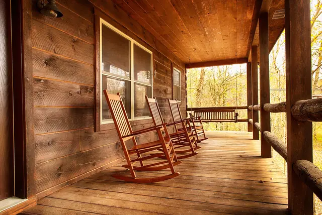 Front porch rockers in golden autumn light