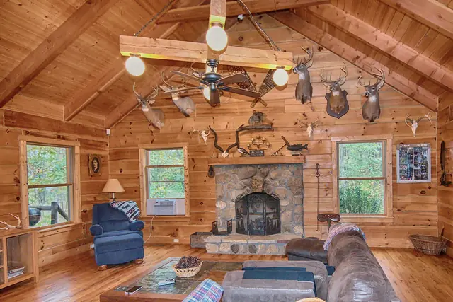 Great room seating around the stone fireplace