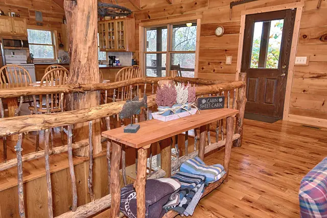 Handmade sofa table and log railing