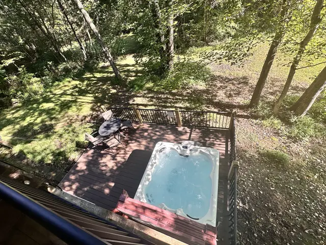 Looking down on the hot tub deck from the upper porch
