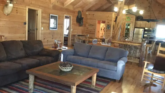 Living area opening to the dining room and kitchen