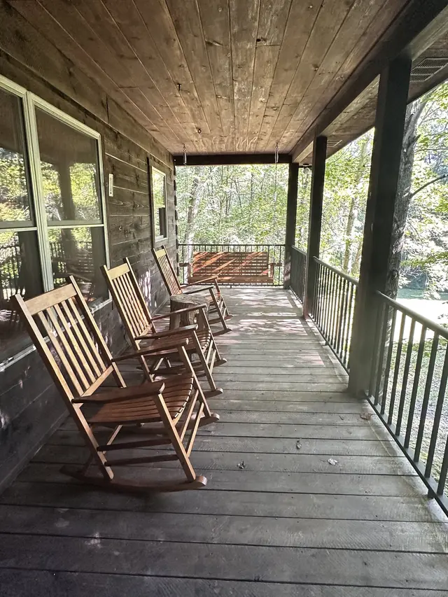Row of rocking chairs on the covered porch