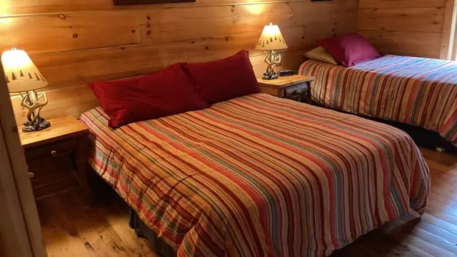 Queen and twin beds in the second bedroom