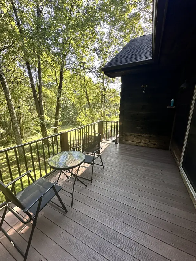 Upper deck with a bistro table and chairs