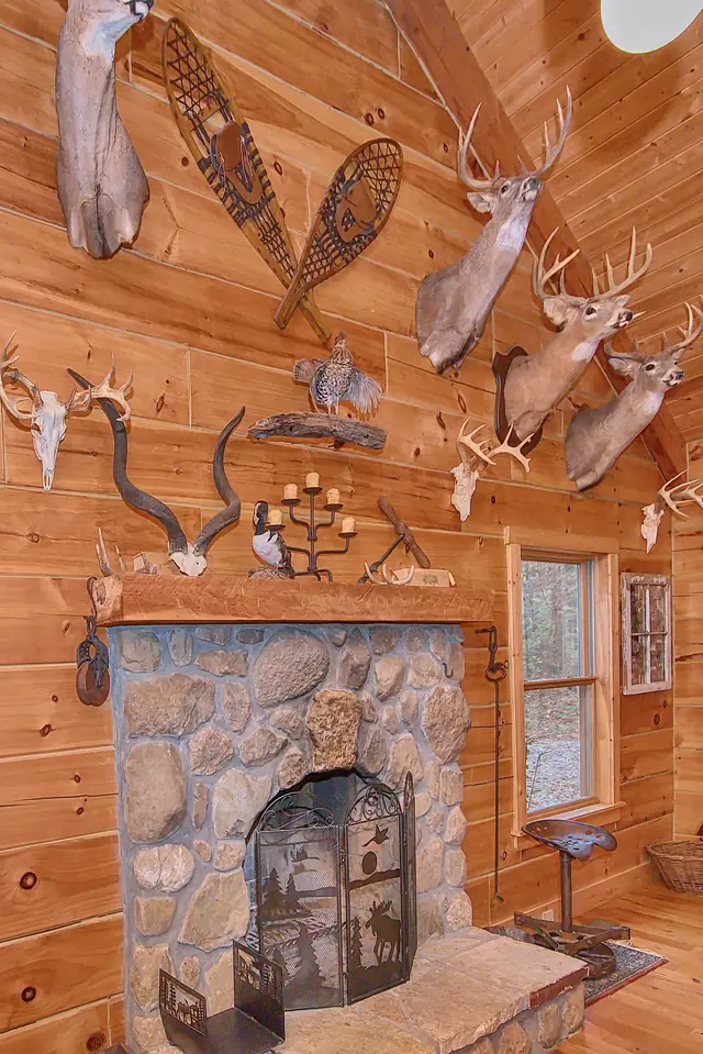 Wood-burning stone fireplace in the great room