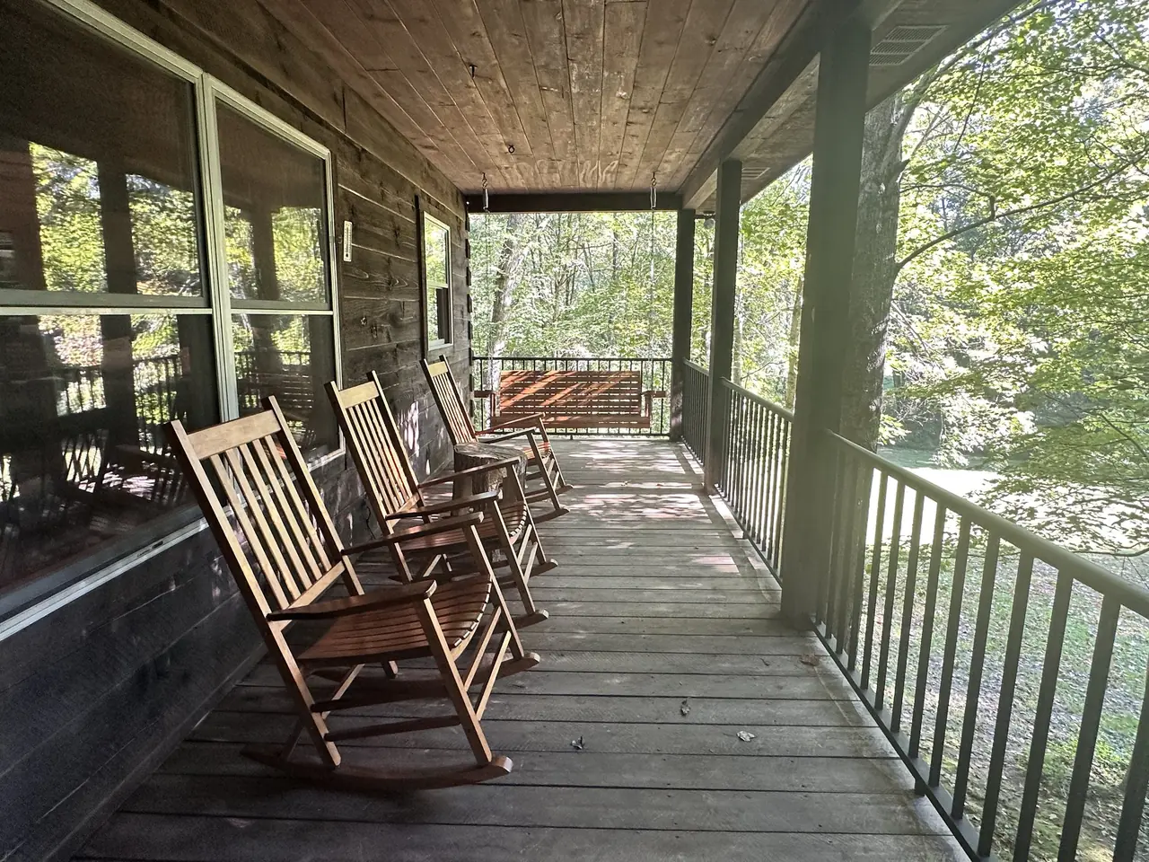 Rocking chairs and porch swing on the covered porch